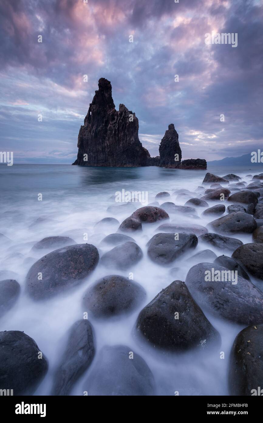 A rock needle in Madeira at sunrise called Ribeira da Janela. Stock Photo