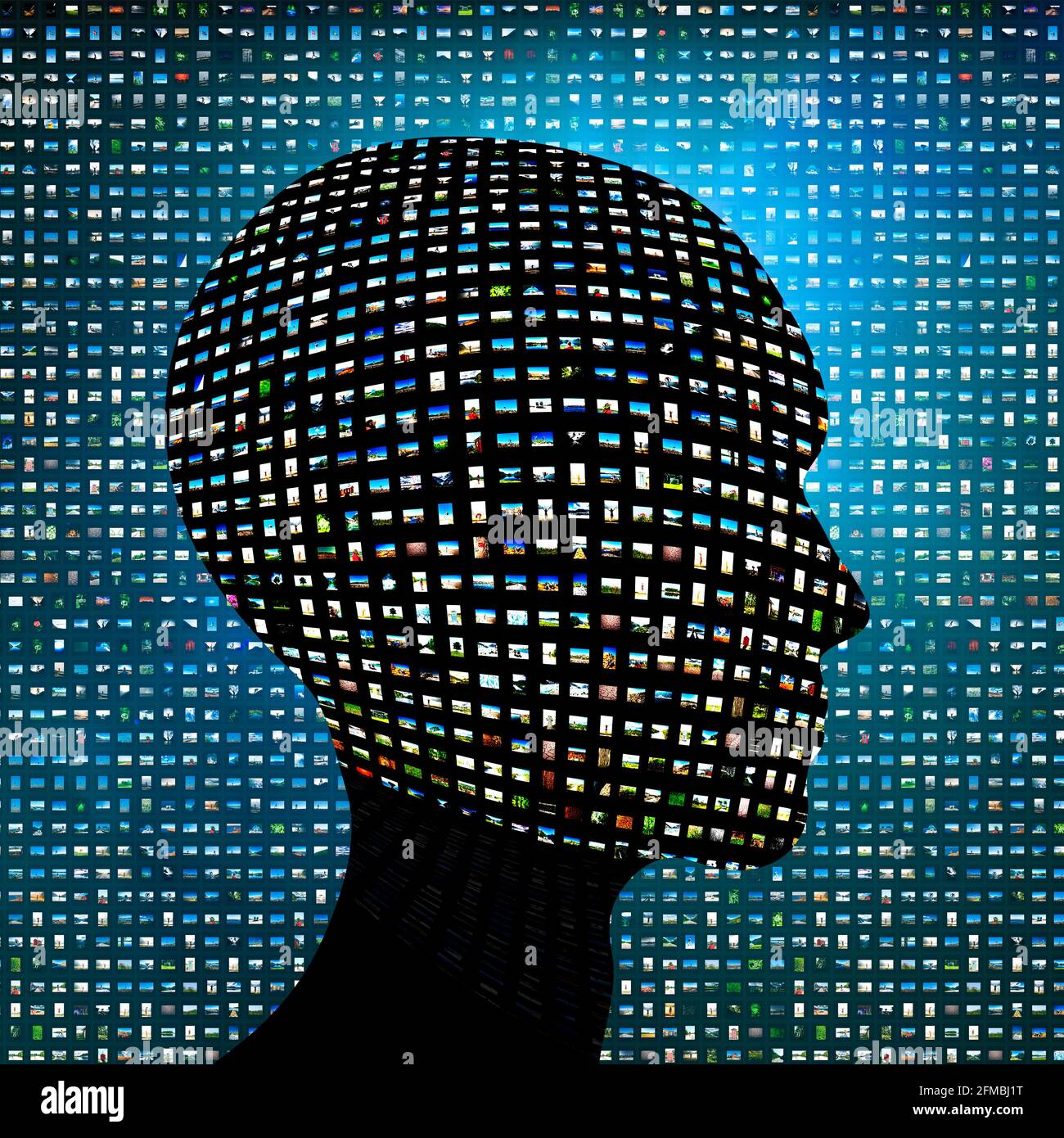 Silhouette of a head with pictures against a background with many pictures Stock Photo