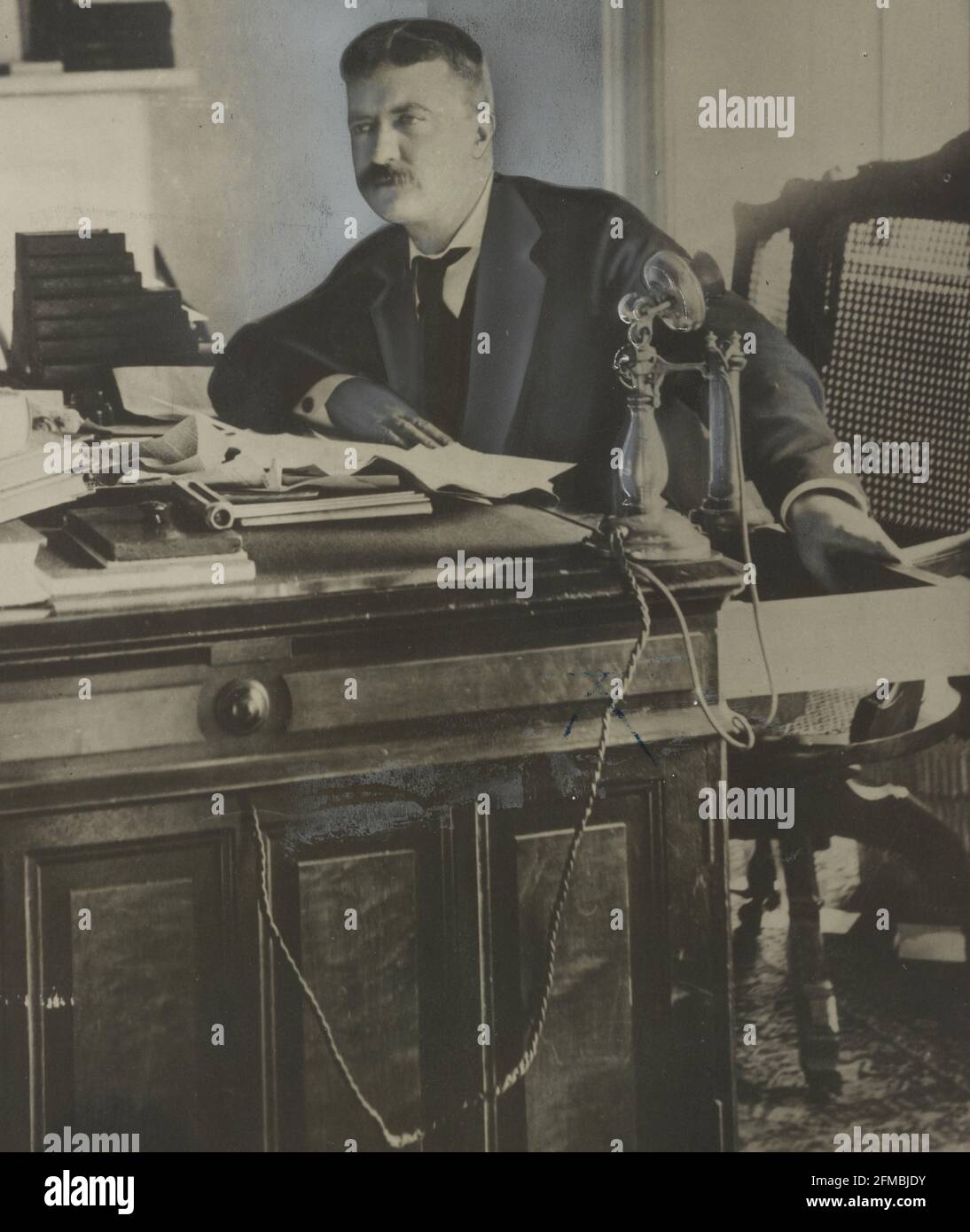 Theodore Roosevelt when he was a New York police commissioner Photograph  showing Theodore Roosevelt, Jr., seated at his desk, facing left. Created /  Published [between 1895 and 1897, printed ca. 1965] Subject, image size:1094x1390