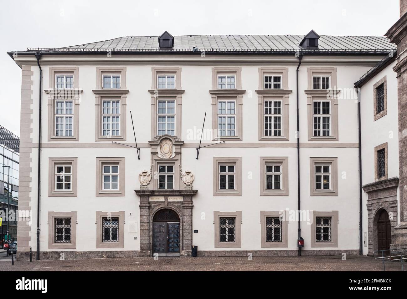 Innsbruck, Austria - February 8 2021: Entrance Door of the Faculty of Theology in the Old Grammar School or Altes Gymnasium in Innsbruck, Tyrol. Stock Photo