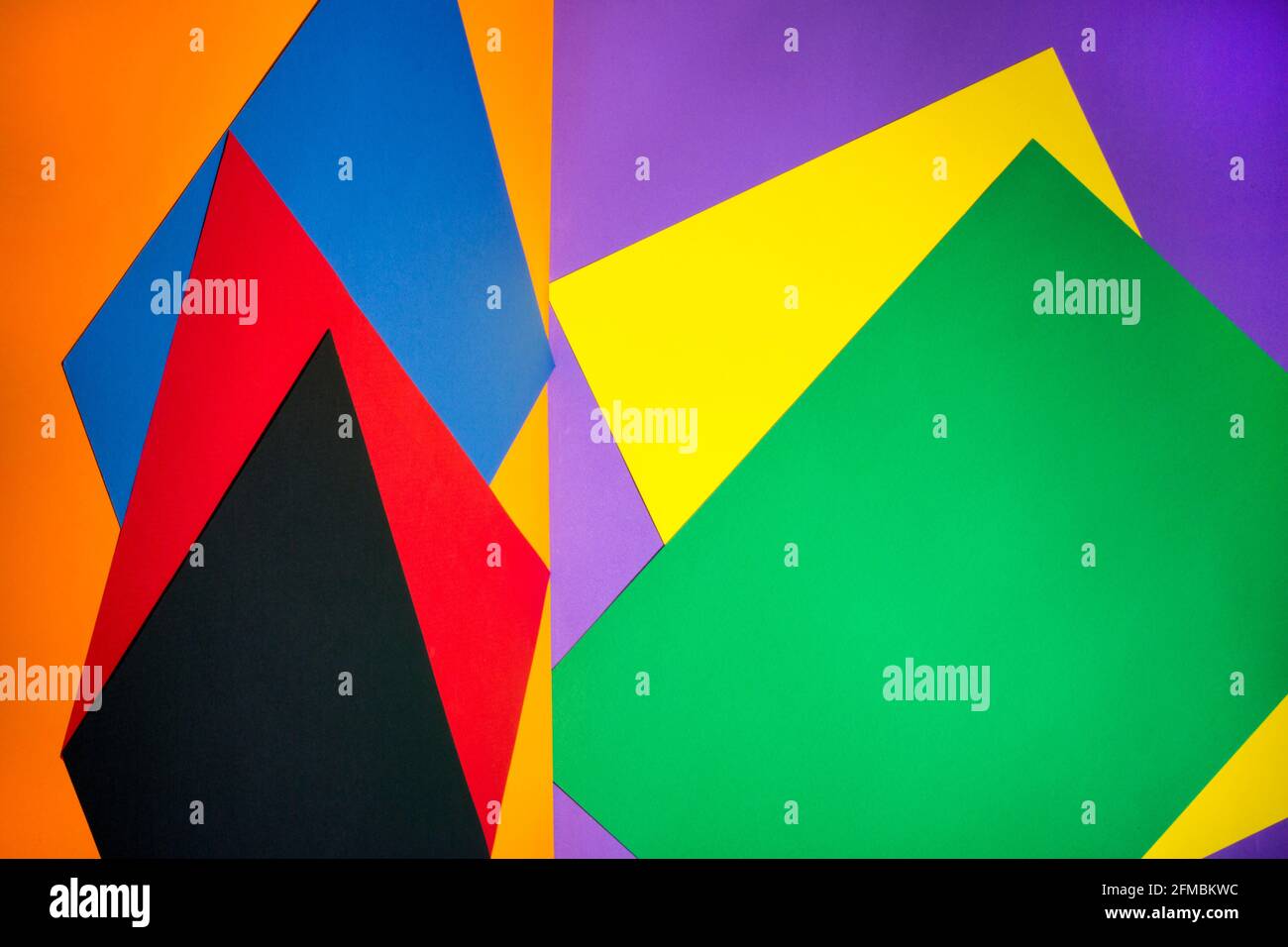 Abstract background from different sheets of colored paper Stock Photo