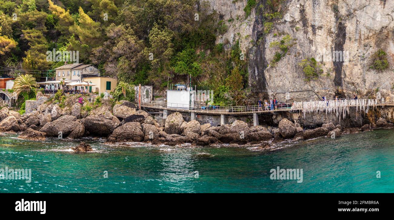 beautiful rocky berth of Punta Chiappa near Portofino in Liguria with sea walkway horizontal italy background Stock Photo