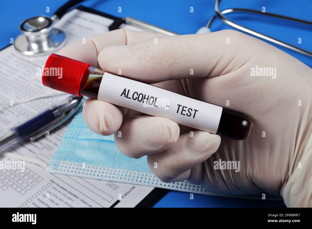 Alcohol test , vacuum tube with blood in the doctor's hand, selective  focus, close-up Stock Photo - Alamy