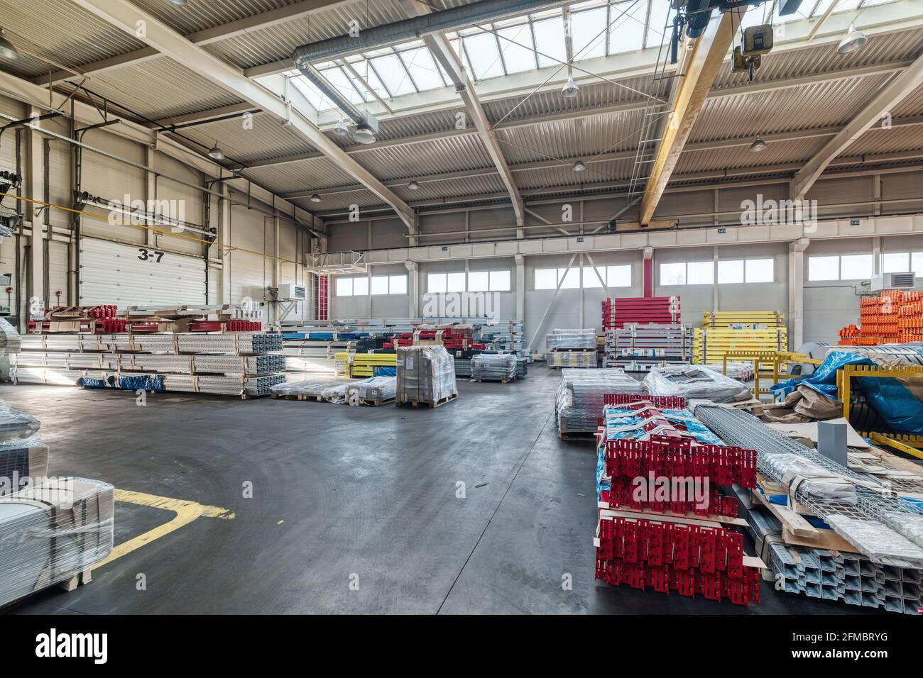 Finished goods warehouse, metal profile packed in bundles Stock Photo