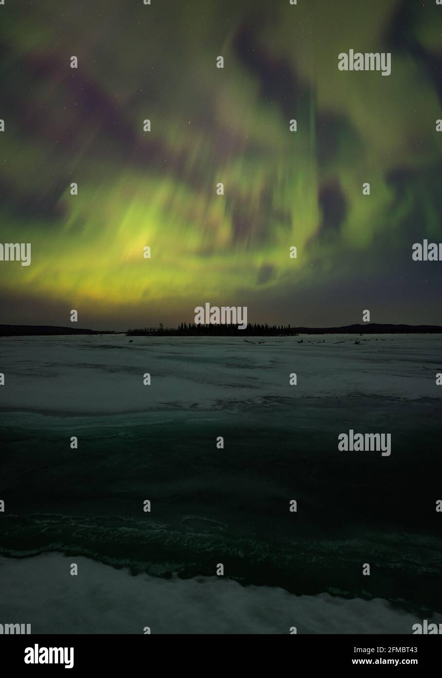 spring road-trip into the chaotic north! Northern lights dancing in full force! Stock Photo