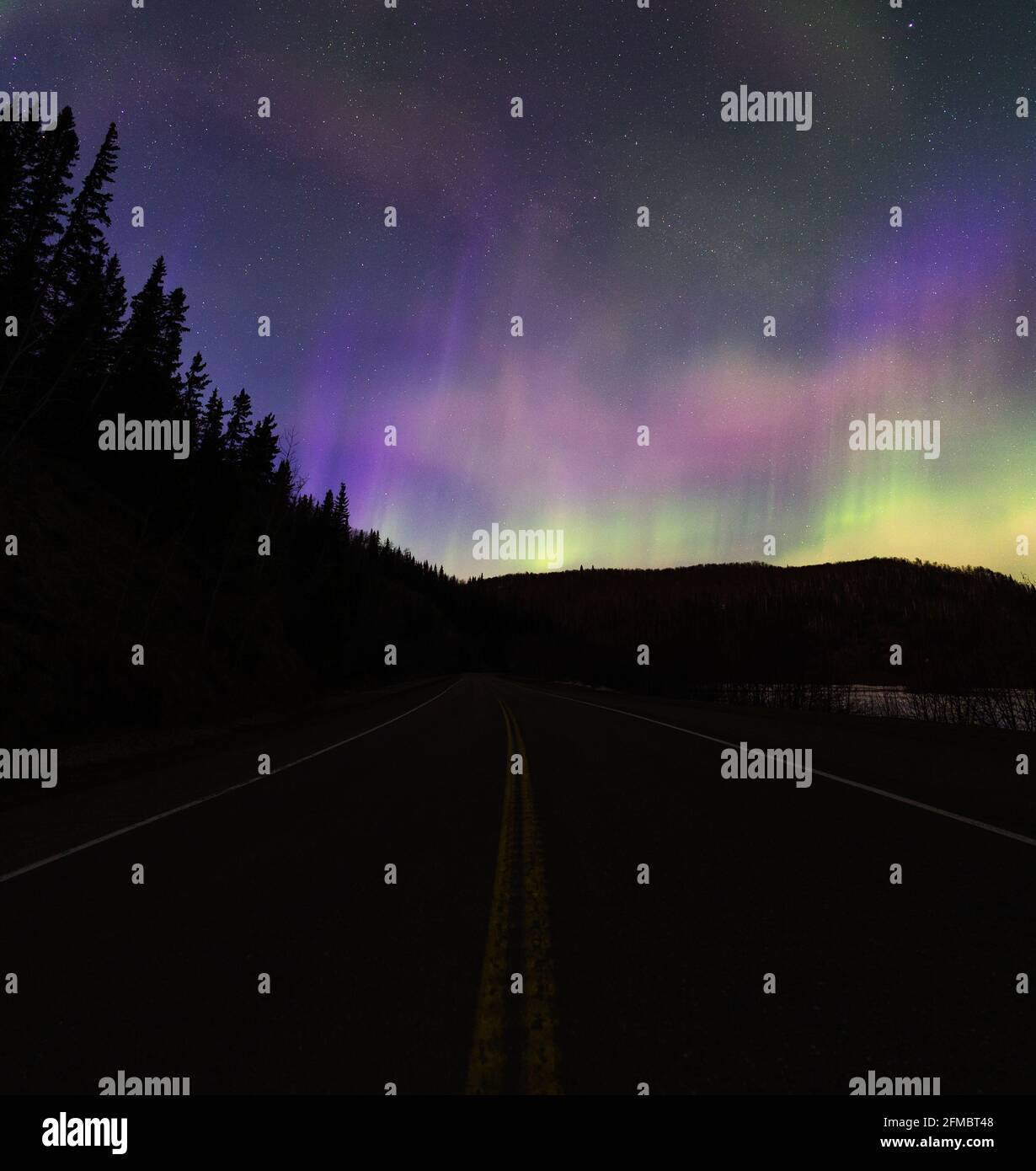 spring road-trip into the chaotic north! Northern lights dancing in full force! Stock Photo