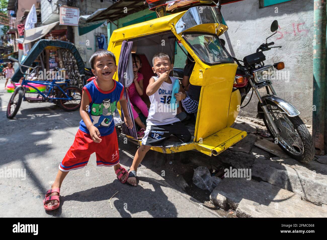 Happy children, Poor district of Manila, Philipines Stock Photo