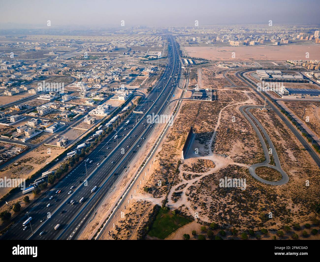 E311 Sheikh Mohammed bin Zayed Road in Dubai suburbs. Main highway in the UAE connecting multiple emirates with traffic load Stock Photo