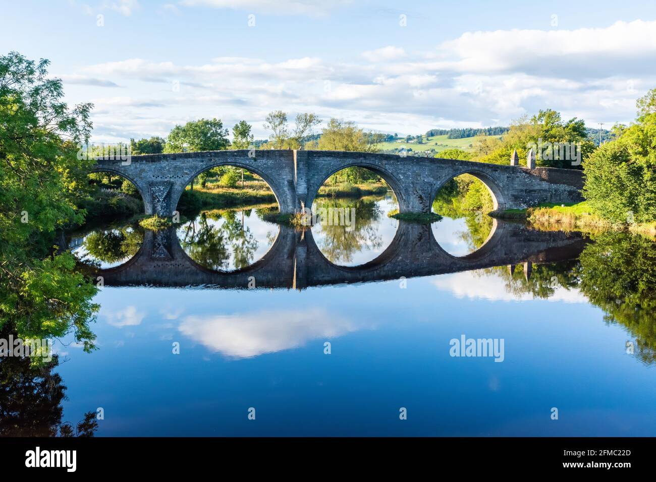 Old Stirling Bridge spanning the River Forth in Scotland. The medieval bridge dates from the 15th century. Stock Photo