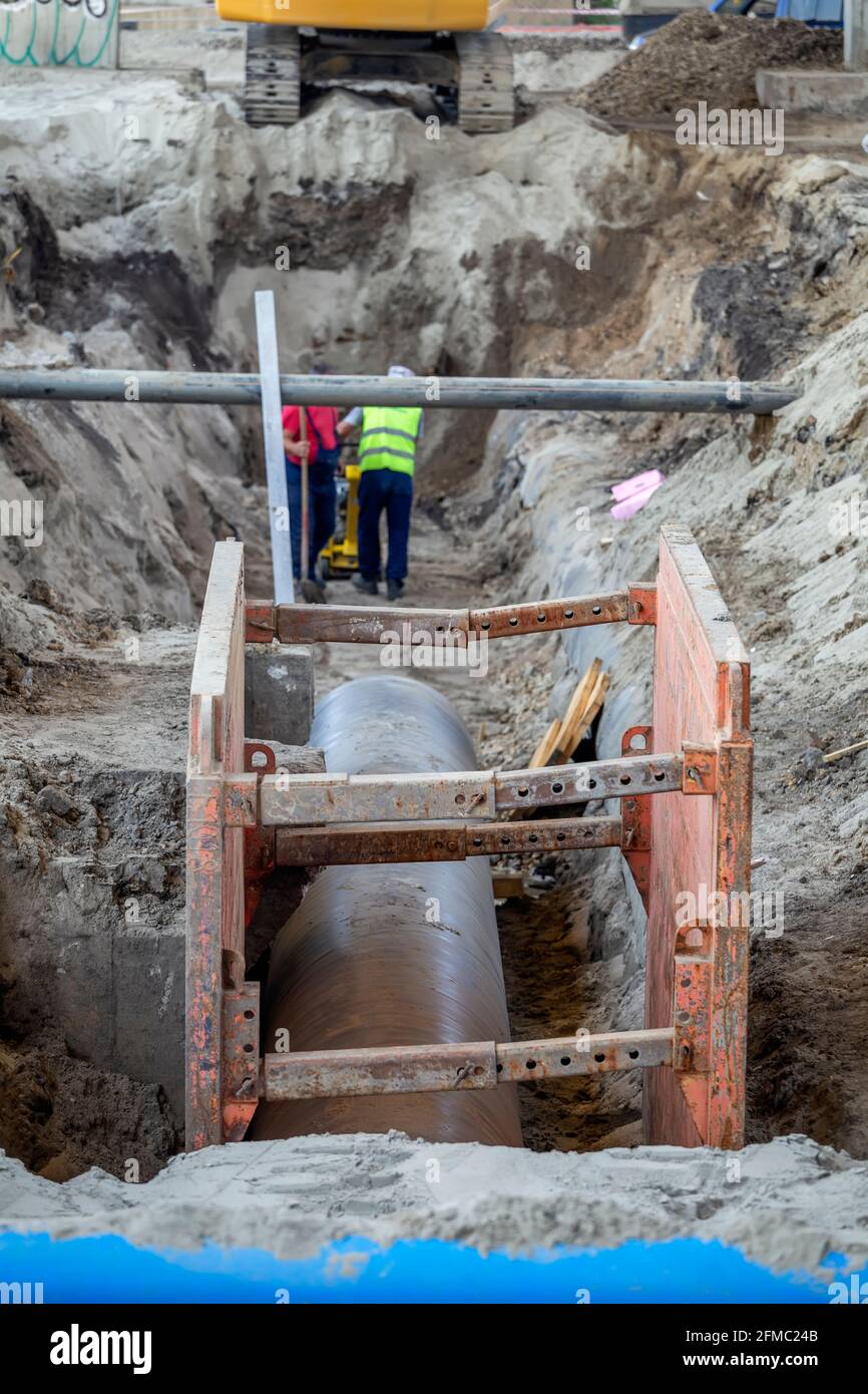 Mechanical walls for supports to prevent sloughing of the soil. Two