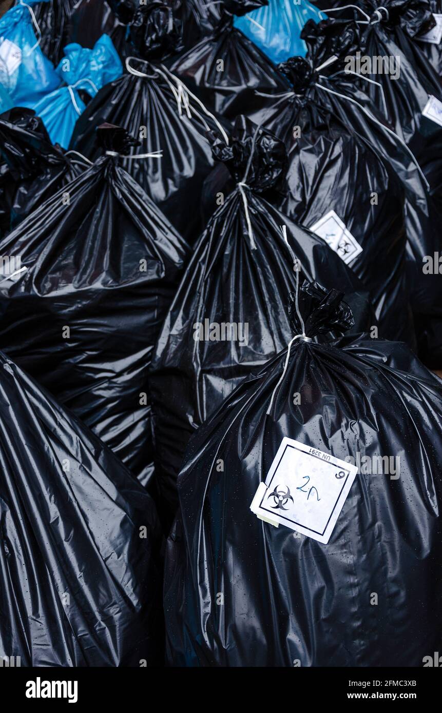 Biohazard waste bags with sticker logo, hospital waste Stock Photo