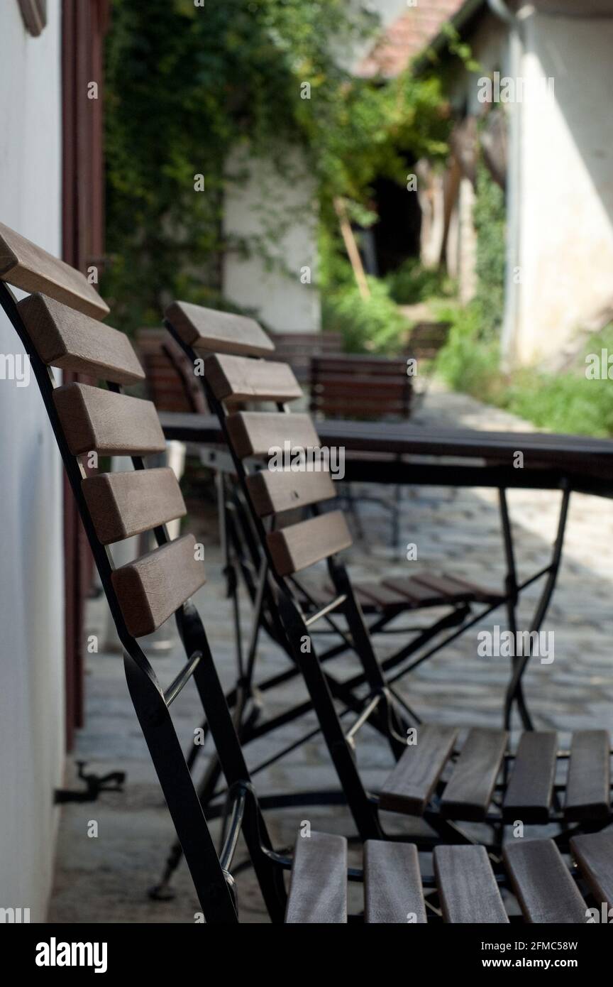 Two empty garden chairs in the yard Stock Photo - Alamy