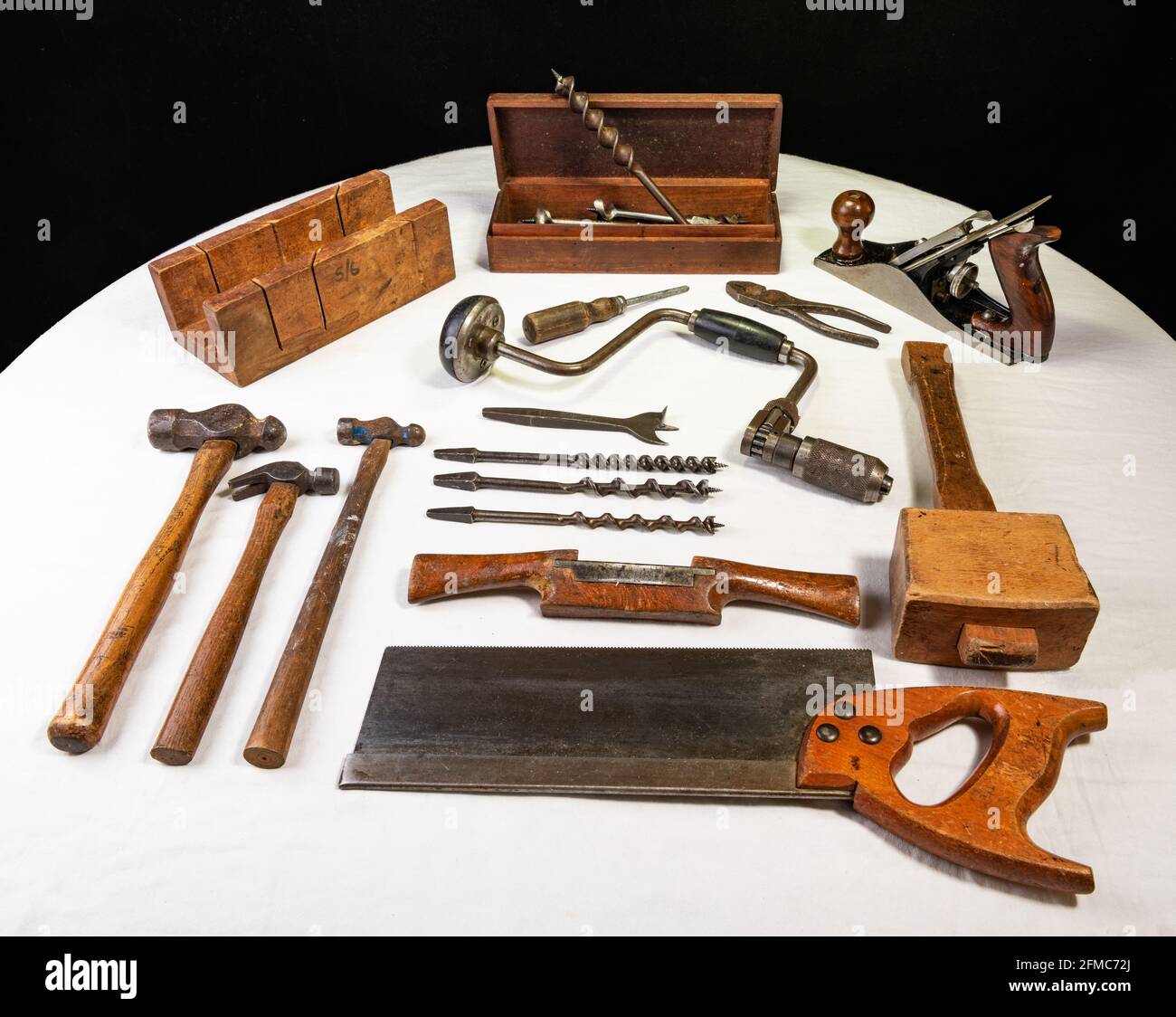Traditional Woodworking Tools laid out on a dust sheet Stock Photo