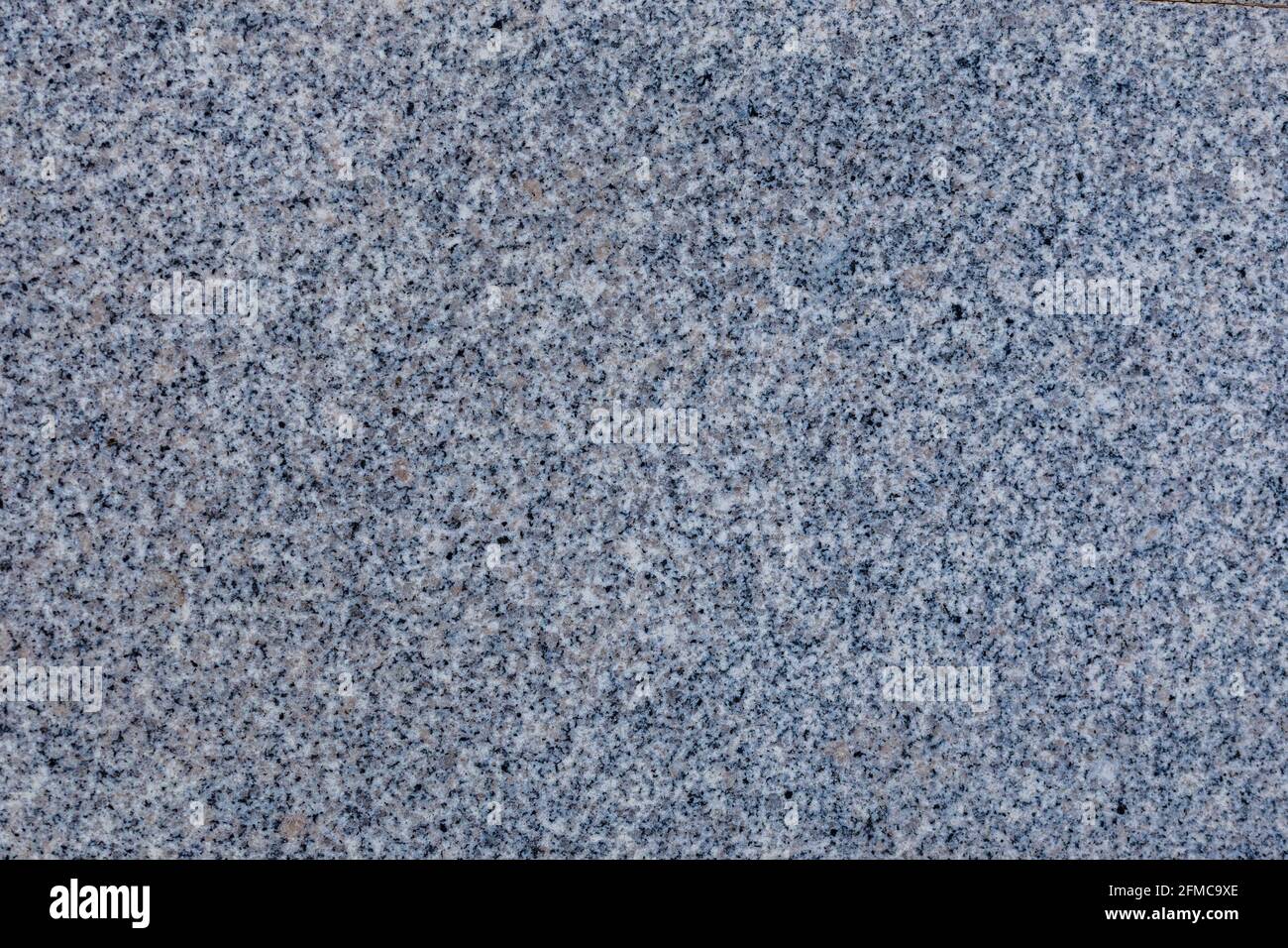 natural granite texture and full frame flat background with fine noise pattern Stock Photo
