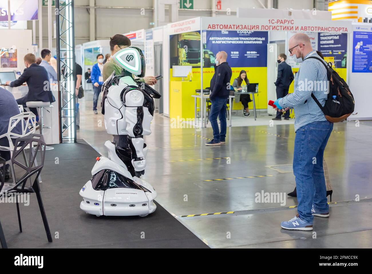 Moscow, Russia - 14 april 2021 : An exhibition visitor contacts an ...