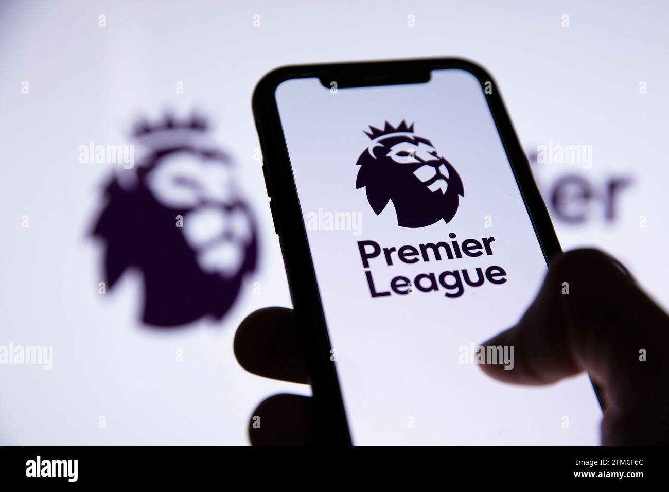 LONDON, UK - May 2021: Premier league football logo on a smartphone screen Stock Photo