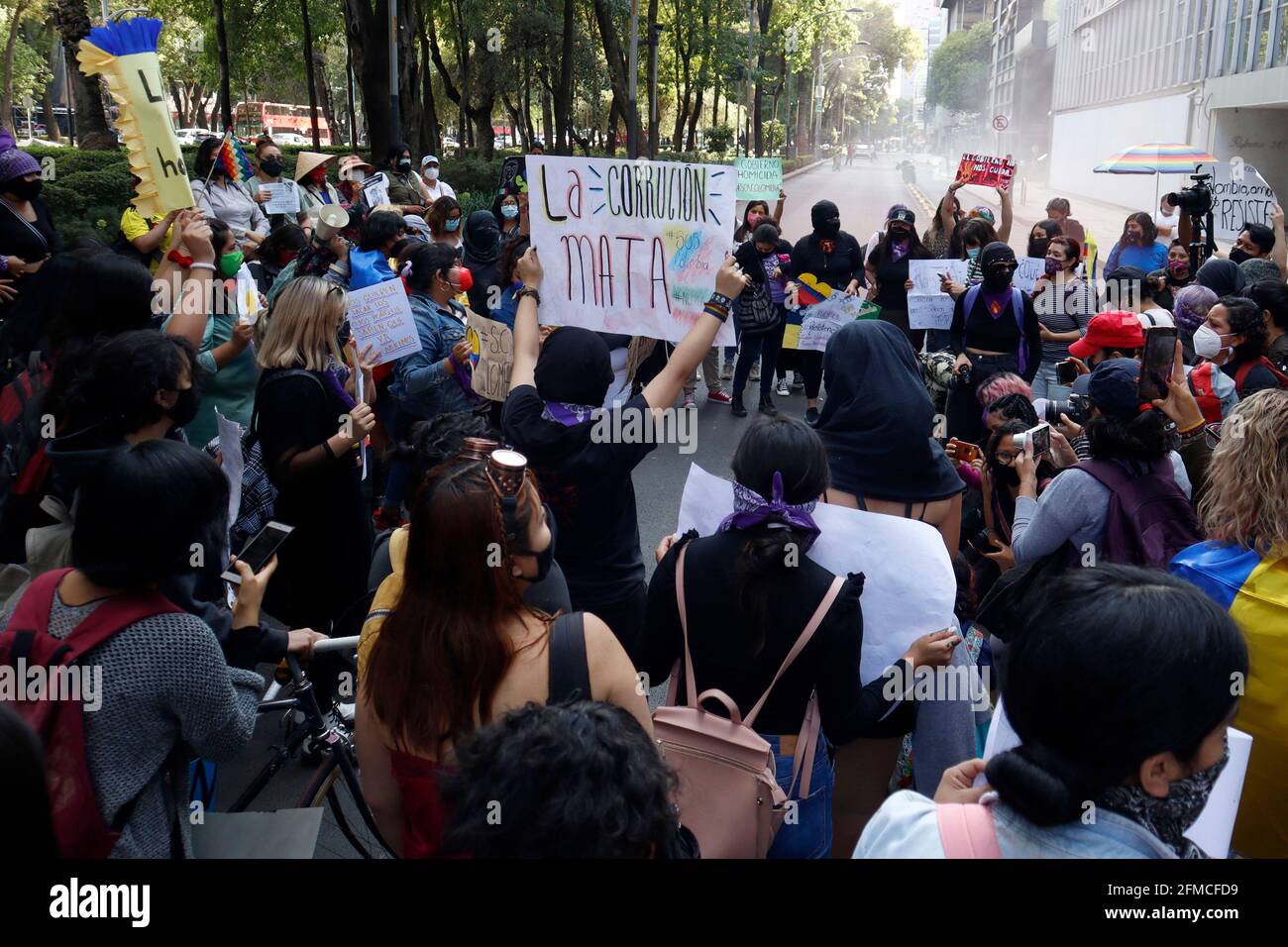 MEXICO CITY, MEXICO - MAY 6: Colombian citizens join a demonstration outside the Colombian embassy in Mexico, to express their anger against the curfew imposed by Colombian President Iván Duque, allowing the military armed forces to disperse protesters with violence due to multiple protests made after President Iván Duque sent Congress a proposal for a tax reform that seeks to generate taxes on the middle class of the Colombian country on May 6, 2021 in Mexico City, Mexico. Credit: Luis Barron/Eyepix Group/The Photo Access Stock Photo