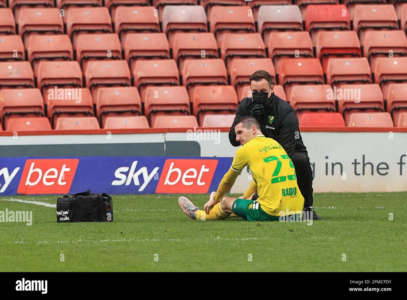 Kenny McLean #23 of Norwich City receive treatment and is substituted after taking a knock to his knee Stock Photo