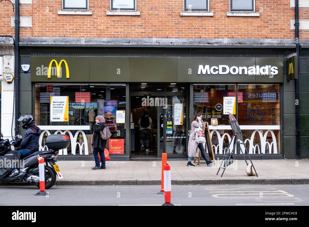 Kingston Upon Thames London UK, May 07 2021, McDonalds Fast Food High Street Takeaway Restaurant Shop Front Stock Photo