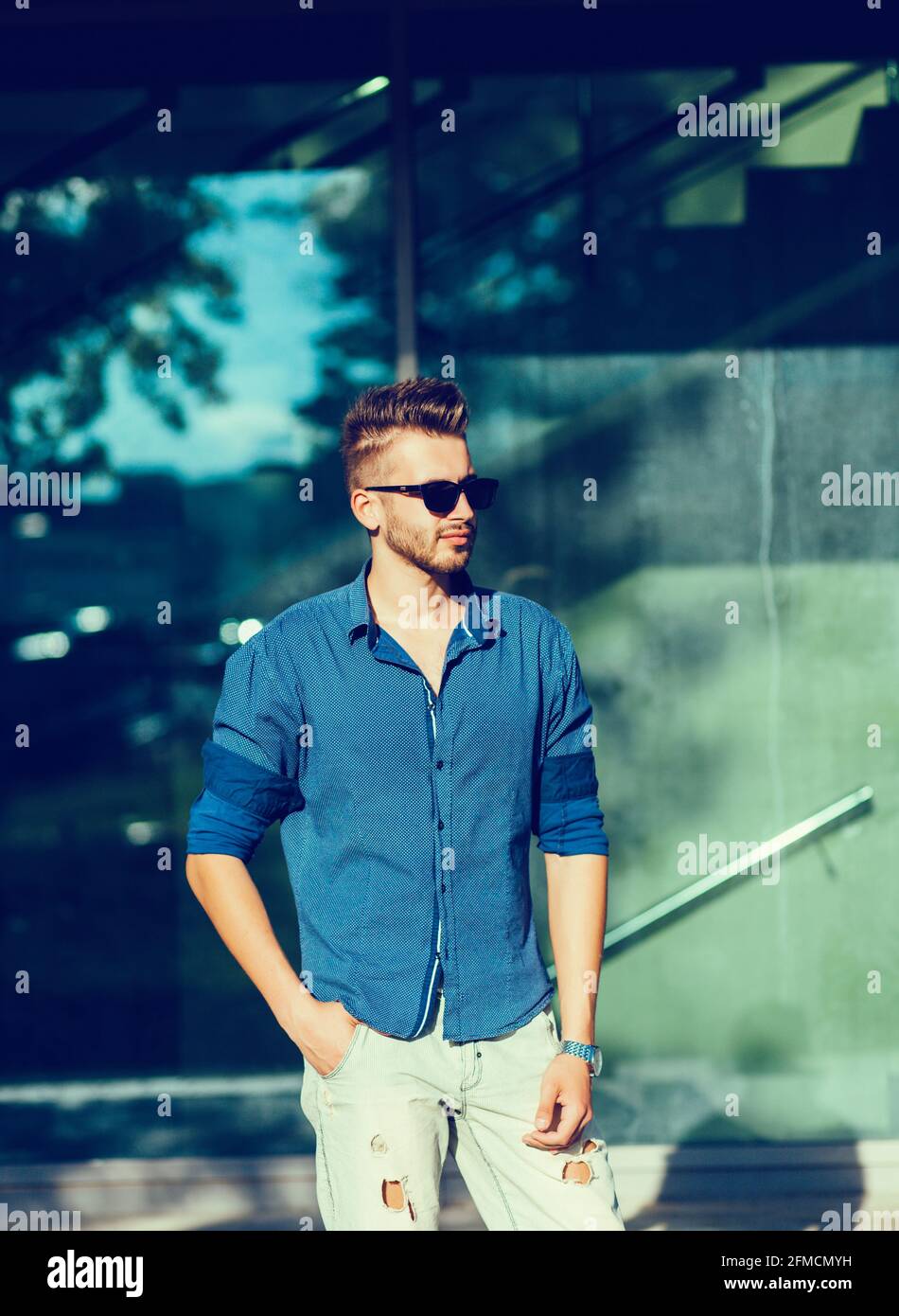 handsome-man-in-blue-shirt-outdoor-stock-photo-alamy