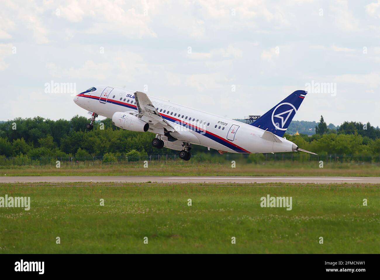 ZHUKOVSKY, RUSSIA - JULY 20, 2017: Take-off passenger aircraft Sukhoi Superjet 100 leaves in the right turn. Zhukovsky Airport, MAKS-2017 Air Show Stock Photo