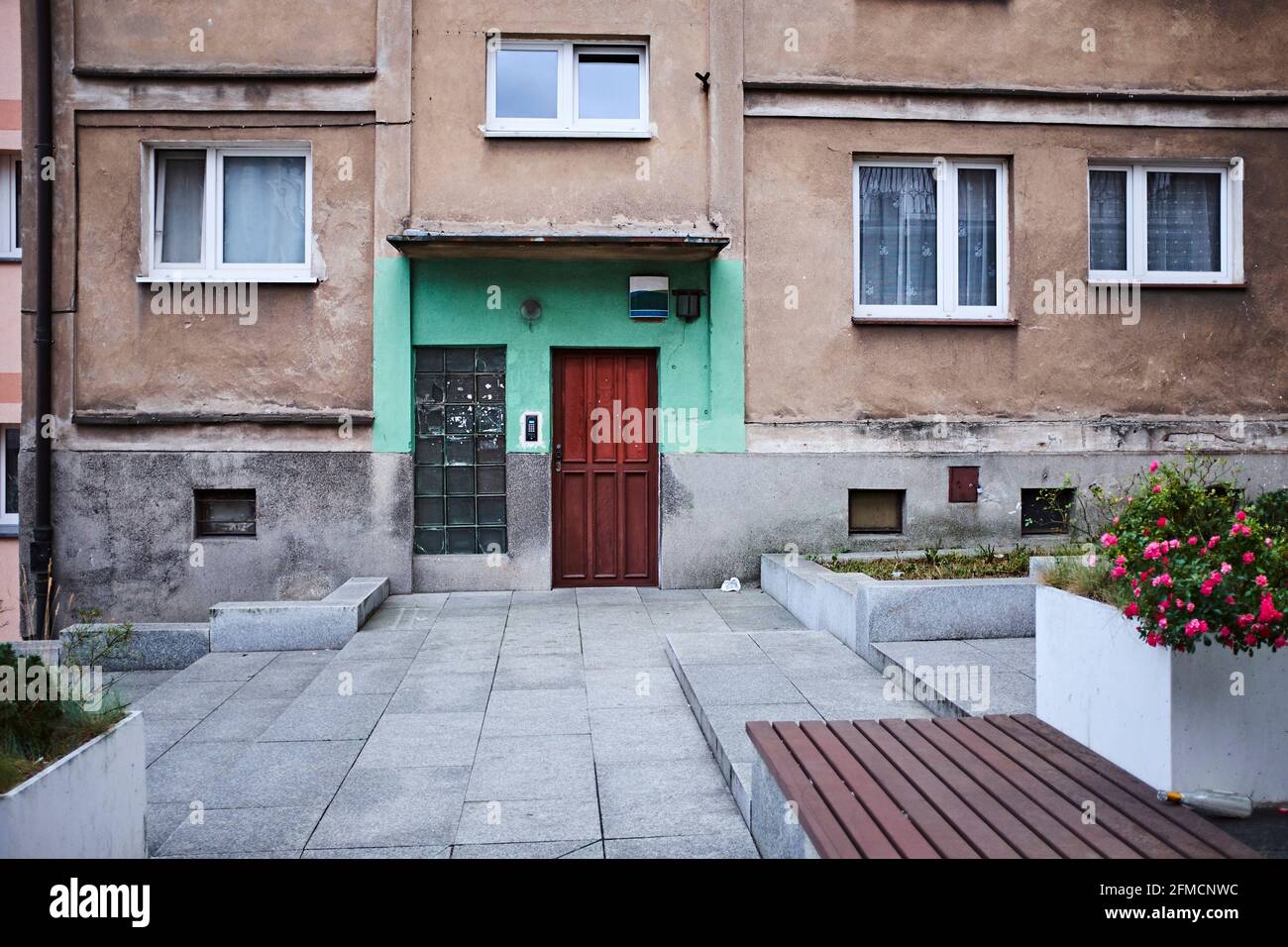 Front door of old apartment building in former soviet republic Stock Photo