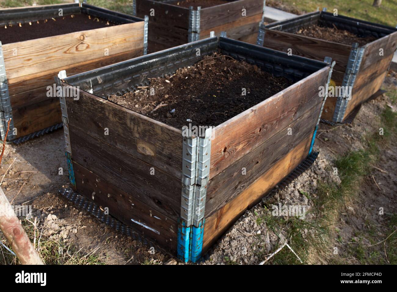 pallet collar raised beds for vegetables planting. permacultural gardening Stock Photo Alamy