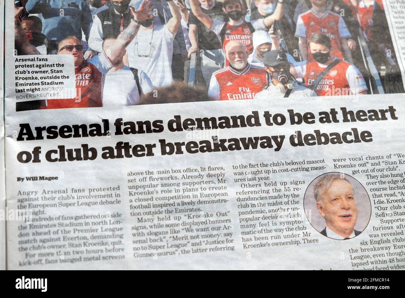 'Arsenal fans demand to be at heart of club after breakaway debacle' Premier Super League article i newspaper headline in April 2021 London England UK Stock Photo