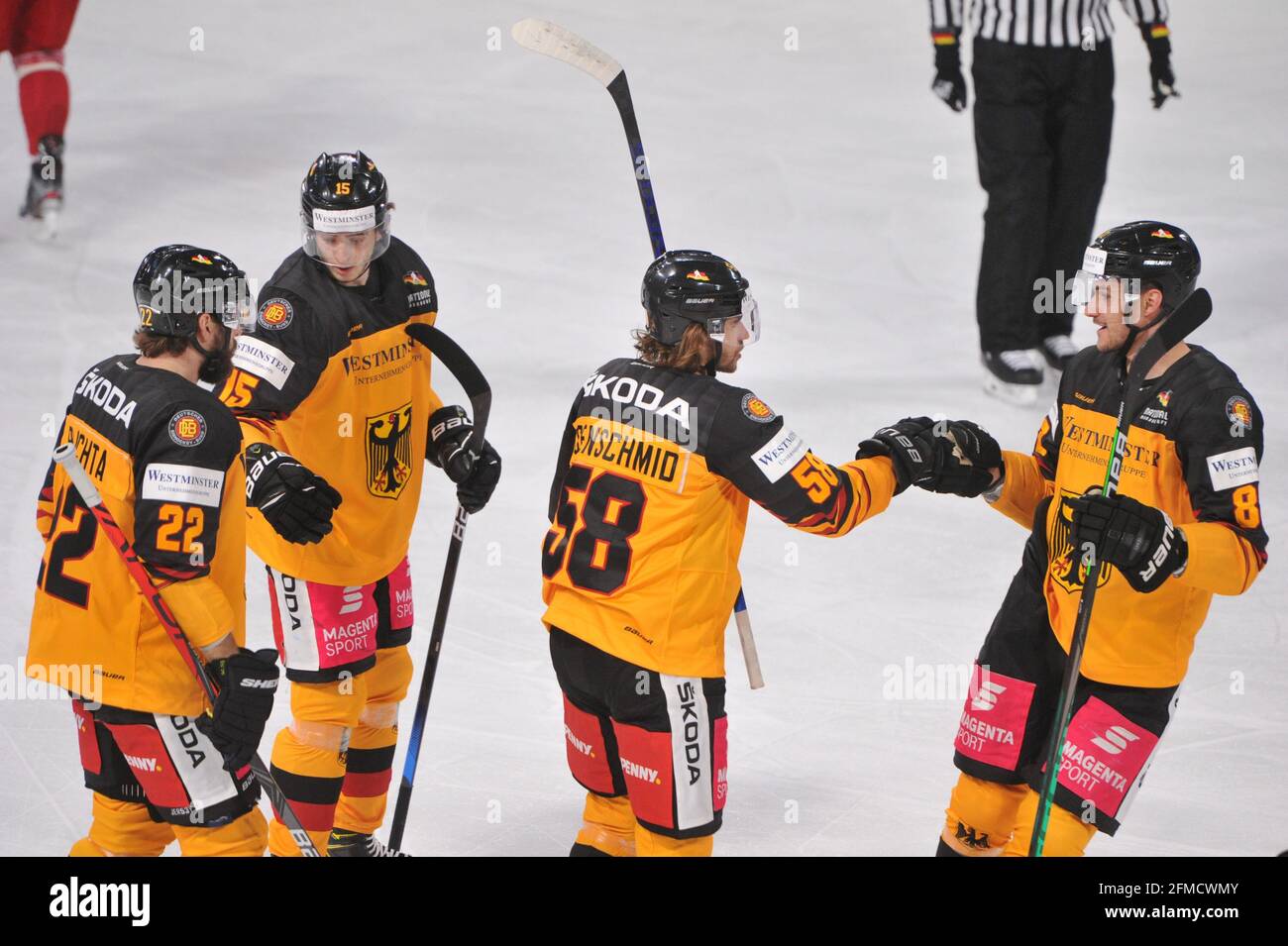 Nuremberg, Germany. 08th May, 2021. Ice hockey: International match, Germany - Belarus in the Arena Nürnberger Versicherung. Markus Eisenschmid (2nd from right) of Germany celebrates with his teammates the goal for 1:0. Credit: Timm Schamberger/dpa/Alamy Live News Stock Photo