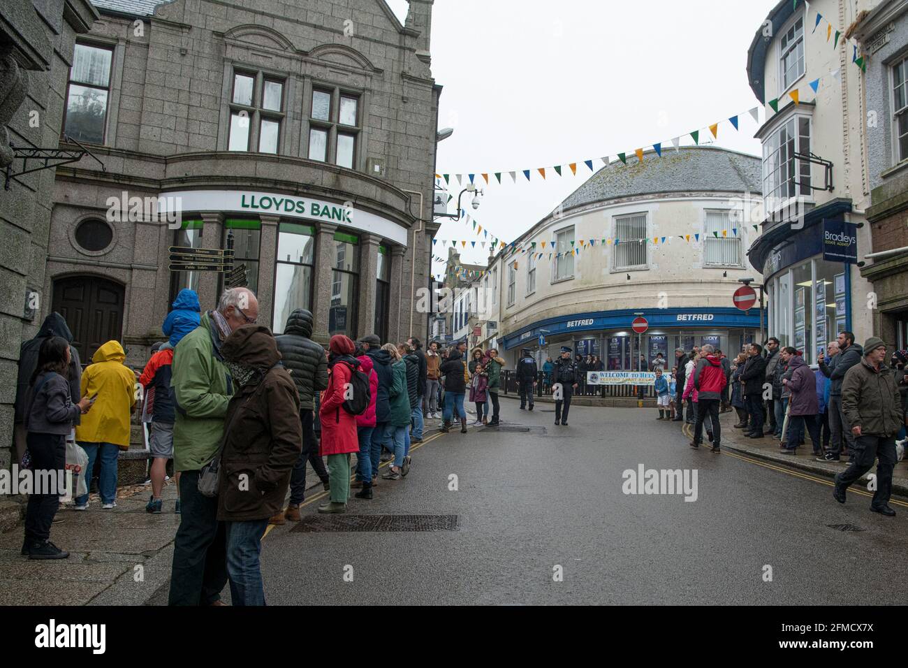 Cornwall, UK. 08th May, 2021. Helston CornwallFlora day 8-04-2021, Police keep a close eye on the small crowd that had gathered in Helston town centre, Helston Cornwall flora day cancelled again in 2021 Credit: kathleen white/Alamy Live News Credit: kathleen white/Alamy Live News Stock Photo