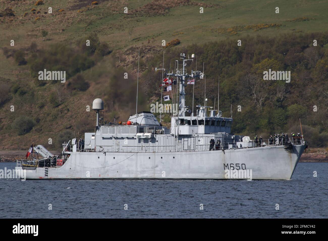 FS Sagittaire (M650), an Eridan-class (or Tripartite) mine countermeasures vessel operated by the French Navy, approaching Fairlie Pier on her arrival for the military exercises Strike Warrior and Joint Warrior 21-1. Stock Photo