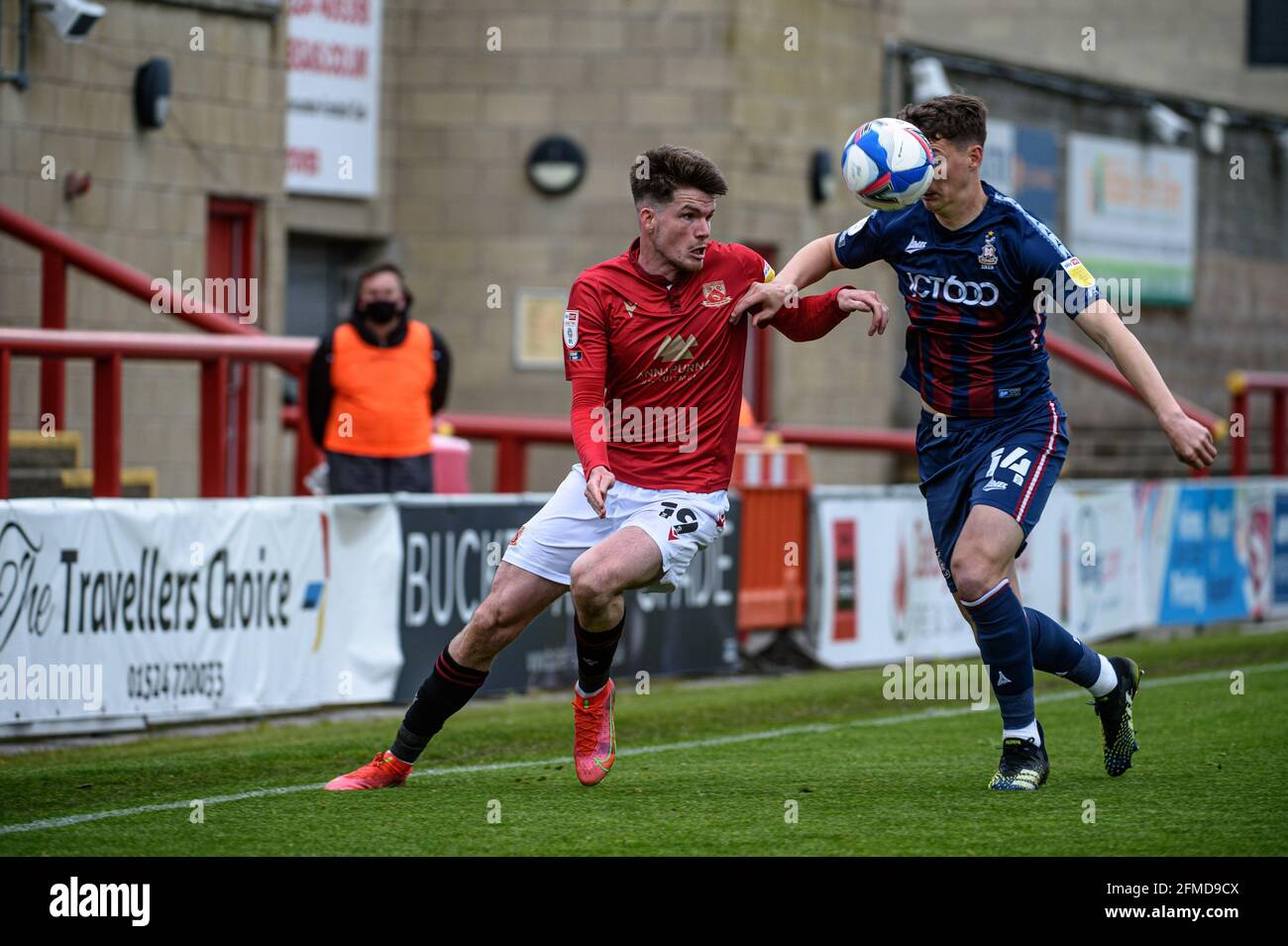 MORECAMBE, UK. MAY 8TH. Paudie O'Connor of Bradford City FC tackles Liam McAlinden of Morecambe FC during the Sky Bet League 2 match between Morecambe and Bradford City at the Globe Arena, Morecambe on Saturday 8th May 2021. (Credit: Ian Charles | MI News) Credit: MI News & Sport /Alamy Live News Stock Photo