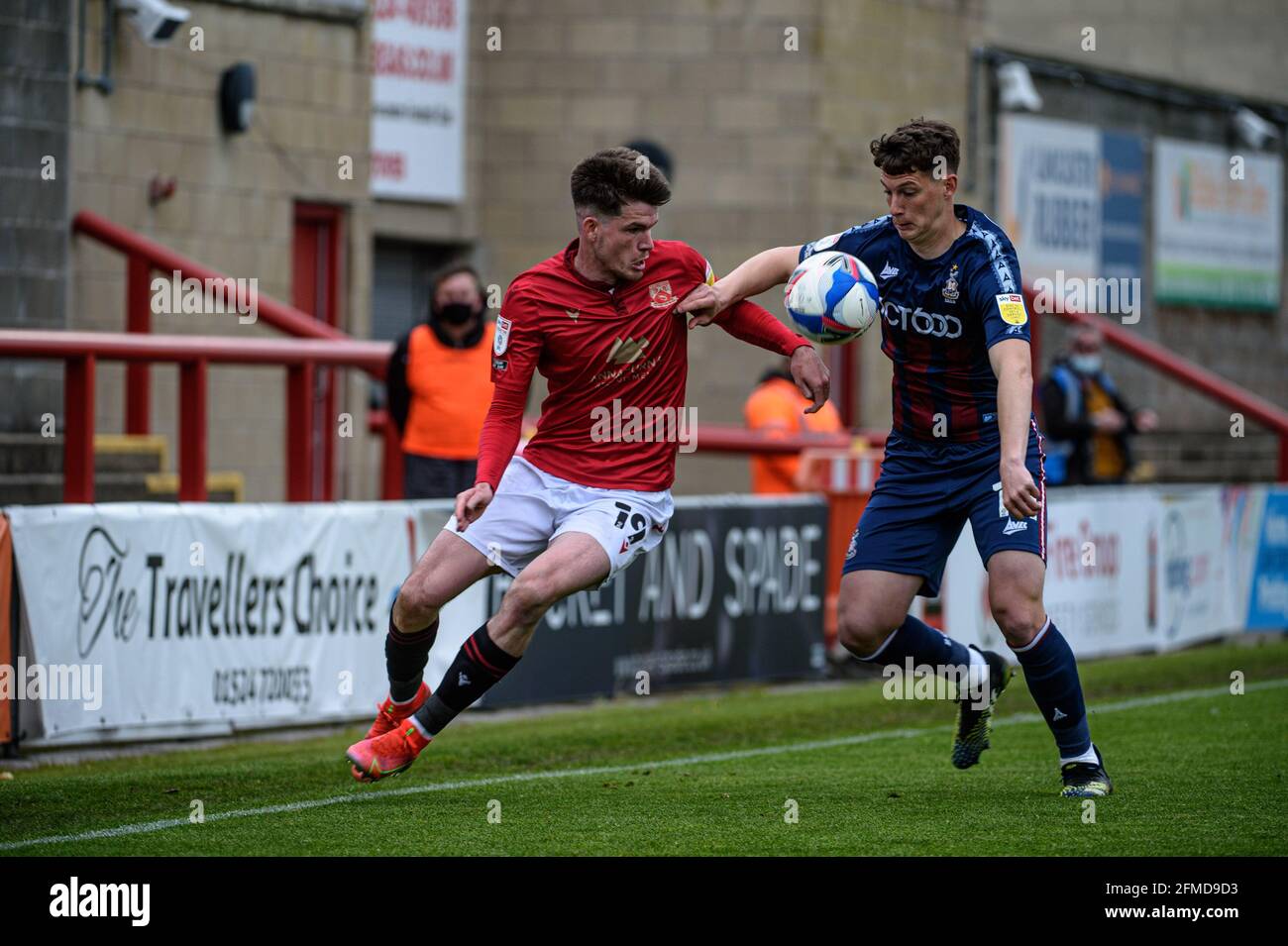 MORECAMBE, UK. MAY 8TH. Paudie O'Connor of Bradford City FC tackles Liam McAlinden of Morecambe FC during the Sky Bet League 2 match between Morecambe and Bradford City at the Globe Arena, Morecambe on Saturday 8th May 2021. (Credit: Ian Charles | MI News) Credit: MI News & Sport /Alamy Live News Stock Photo