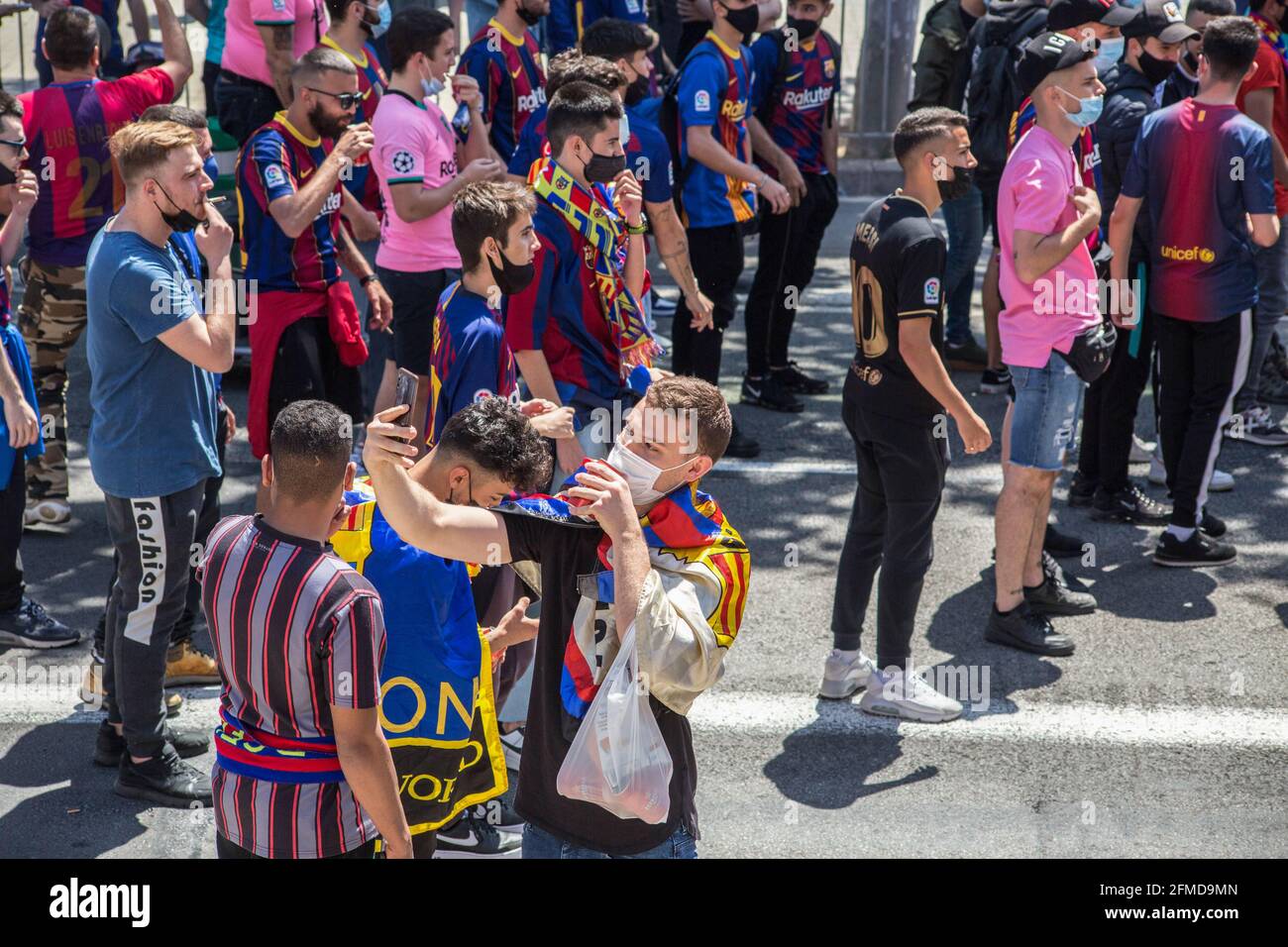Barcelona, Spain. 08th May, 2021. Football Club Barcelona fan takes a selfie. The ultras supporter group of Football Club Barcelona, Boixos Nois (Crazy Boys) have gathered outside the Camp Nou stadium to motivate the team before the match against Club Atletico de Madrid for the 35th round of La Liga, the Spanish football league. Barça's victory will put the team, currently in third place, ahead of Atletico de Madrid, which occupies the first position. Credit: SOPA Images Limited/Alamy Live News Stock Photo