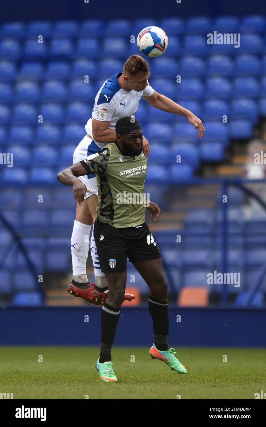 Birkenhead, UK. 8th May, 2021. Frank Nouble of Colchester United looks to win a header in the air against George Ray of Tranmere Rovers during the Sky Bet League Two match between Tranmere Rovers v Colchester United, Prenton Park. Credit: MatchDay Images Limited/Alamy Live News Stock Photo
