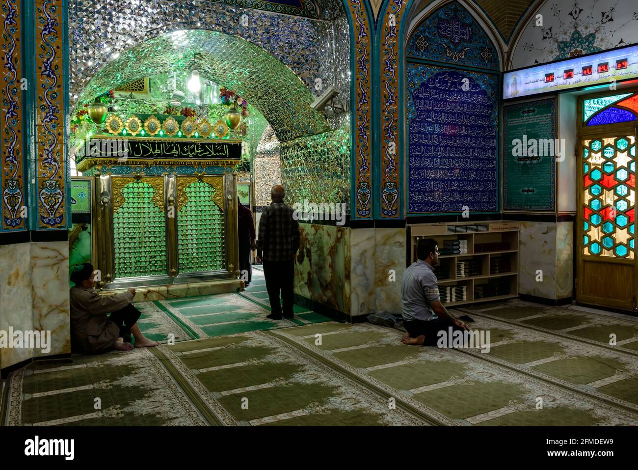 Praying Men In The Holy Shrine Of Imamzadeh Hilal Ibn Ali Or Blue Mosque In Aran Va Bidgol Iran
