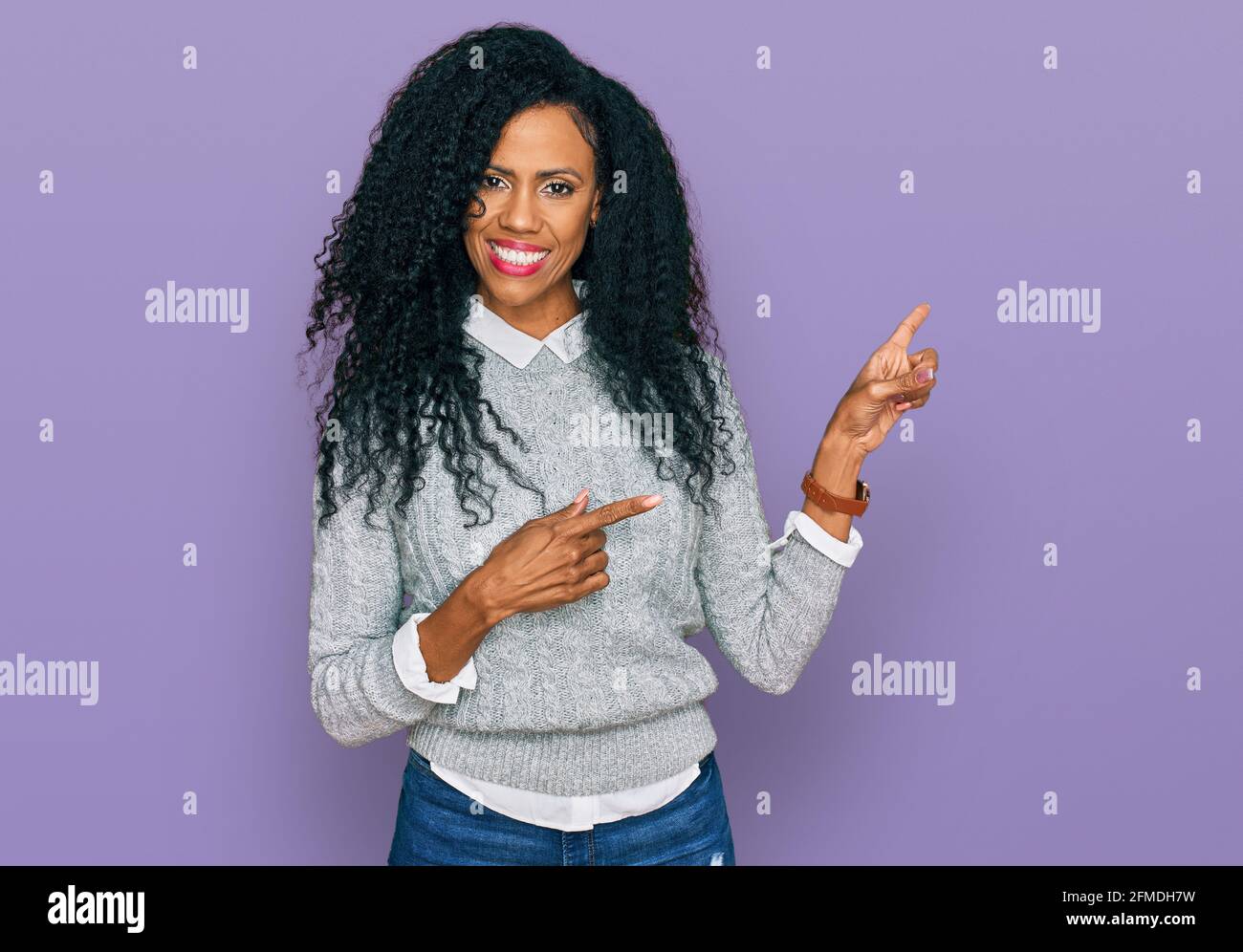Middle age african american woman wearing casual clothes smiling and ...