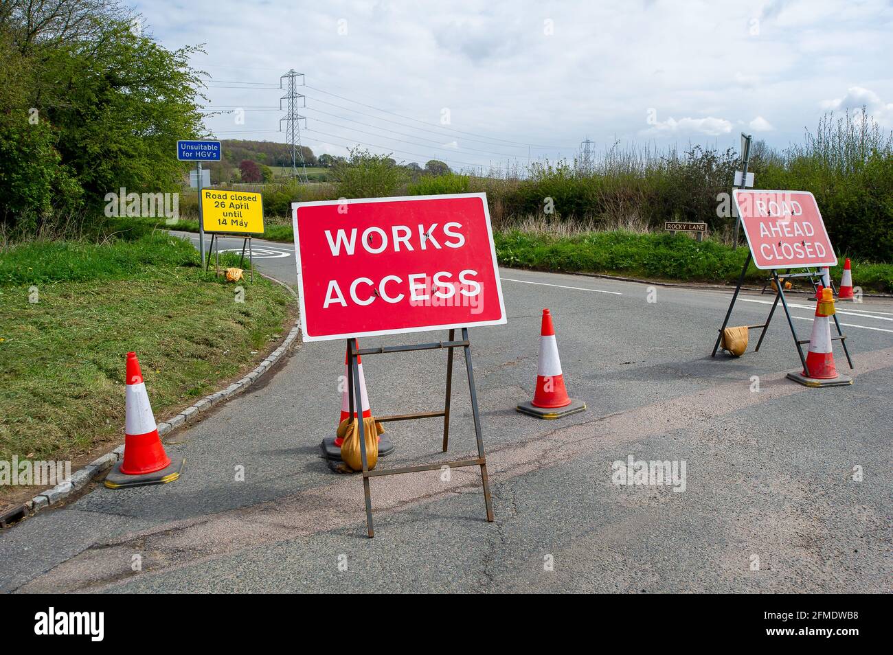 Aylesbury Vale, Buckinghamshire, UK. 29th April, 2021. HS2 have closed Rocky Road until 14th May 2021 for more work on the construction of the High Speed Rail from London to Birmingham. HS2 Security are stopping traffic and HS2 CCTV cameras are being used by HS2. HS2 have also closed a number of local footpaths including the bridleway from Rocky Lane to Durham Farm, however, none of the footpath closures are listed by Buckinghamshire Council on their website. Credit: Maureen McLean/Alamy Stock Photo