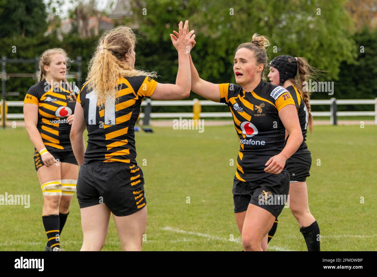 London, UK. 08th May, 2021. Flo Williams (10 Wasps FC Ladies) and Abby Dow (11 Wasps FC Ladies) celebrating the victory after the Allianz Premier 15s game between Wasps FC Ladies and Bristol Bears Women at Twyford Avenue in London, England. Credit: SPP Sport Press Photo. /Alamy Live News Stock Photo