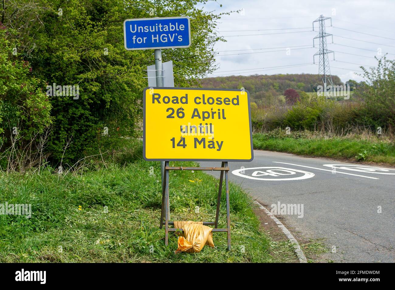 Aylesbury Vale, Buckinghamshire, UK. 29th April, 2021. HS2 have closed Rocky Road until 14th May 2021 for more work on the construction of the High Speed Rail from London to Birmingham. HS2 Security are stopping traffic and HS2 CCTV cameras are being used by HS2. HS2 have also closed a number of local footpaths including the bridleway from Rocky Lane to Durham Farm, however, none of the footpath closures are listed by Buckinghamshire Council on their website. Credit: Maureen McLean/Alamy Stock Photo