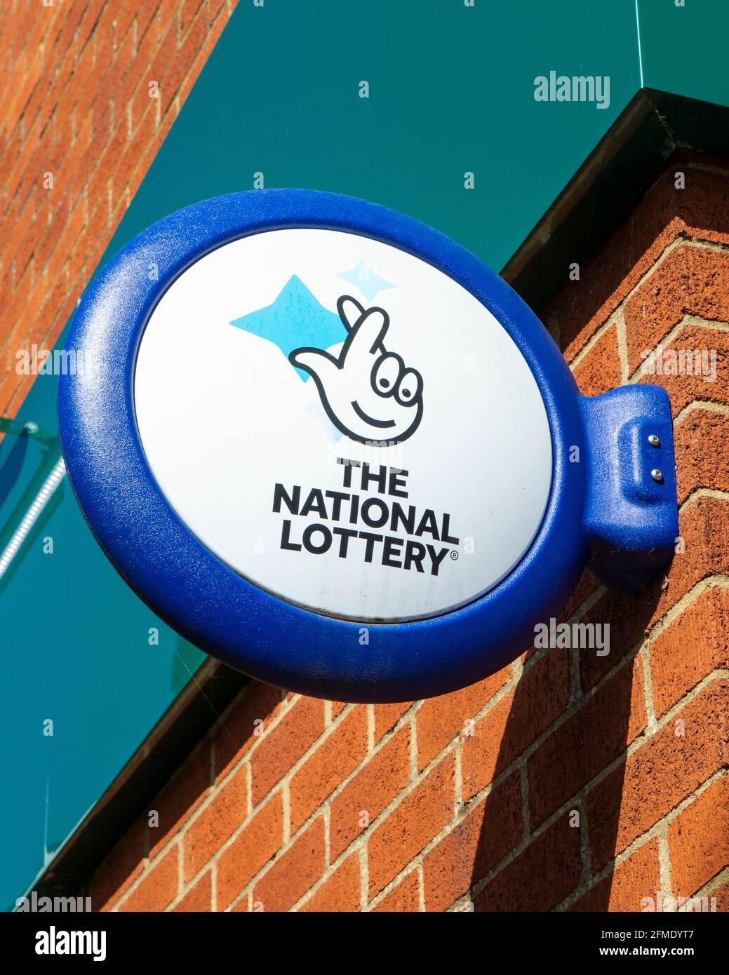 Hertfordhire, UK - April 22nd 2021: Close-up of The National Lottery symbol outside a newsagents shop in the United Kingdom. Stock Photo
