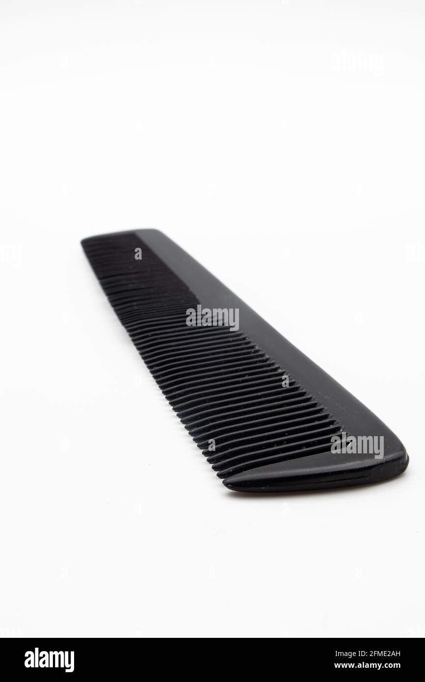 Zürich, Switzerland - November 4, 2020: Black pocket comb on a white  background Stock Photo - Alamy