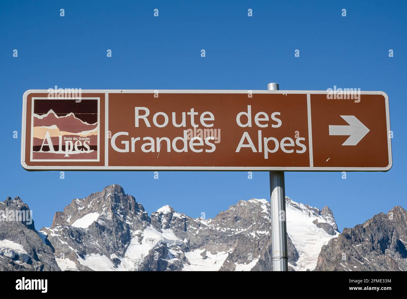 Col du Lautaret, France - July 8, 2020: A sign showing the direction of the road of Alps. Stock Photo