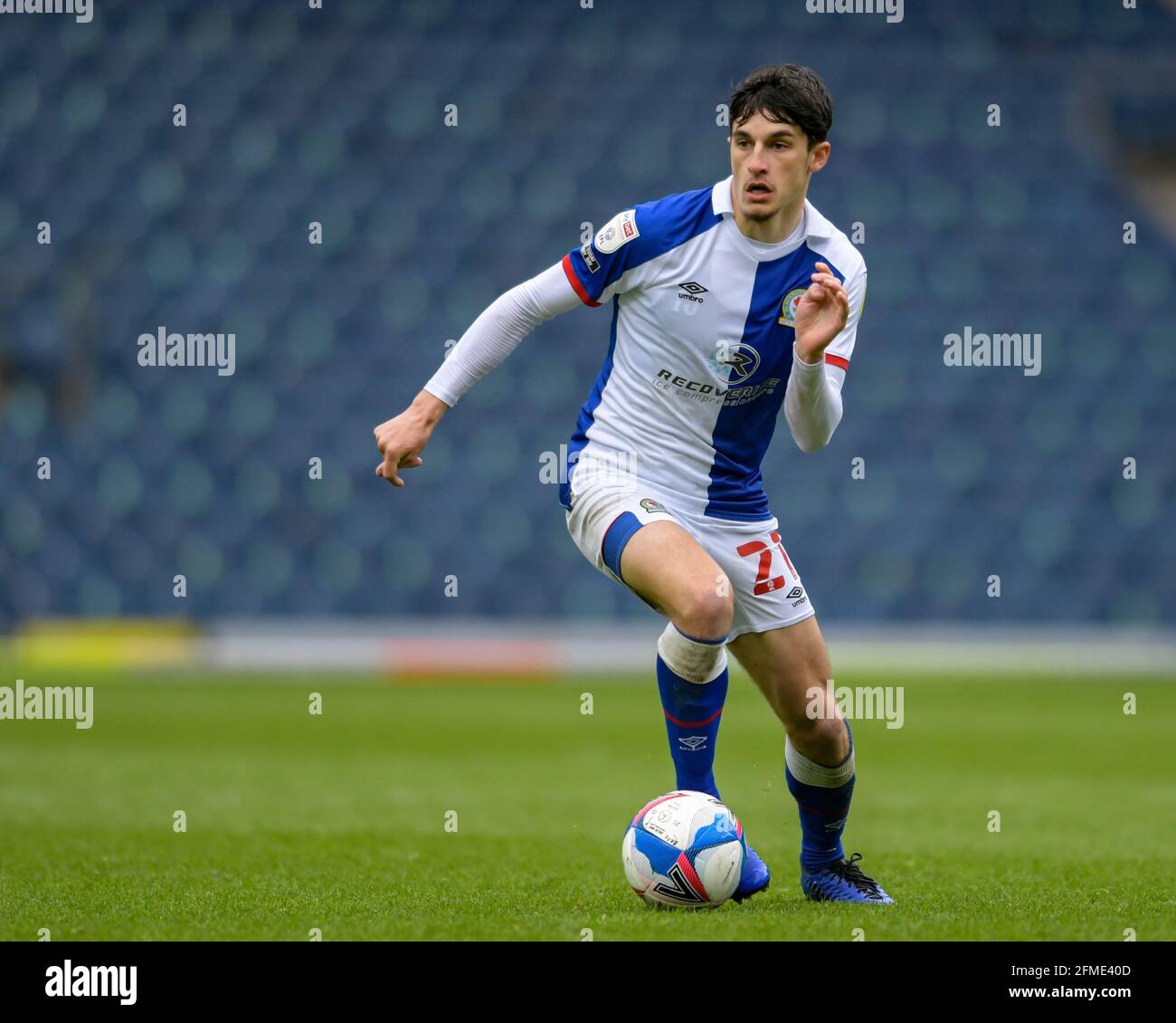 John Buckley #21 of Blackburn Rovers Under pressure fromAndy Rinomhota #35  of Cardiff City during the Sky Bet Championship match Cardiff City vs  Blackburn Rovers at Cardiff City Stadium, Cardiff, United Kingdom