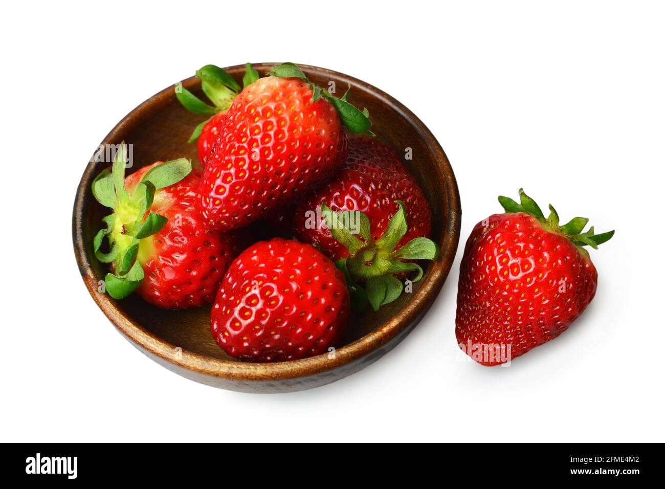 Strawberries in a bowl isolated on white background Stock Photo - Alamy