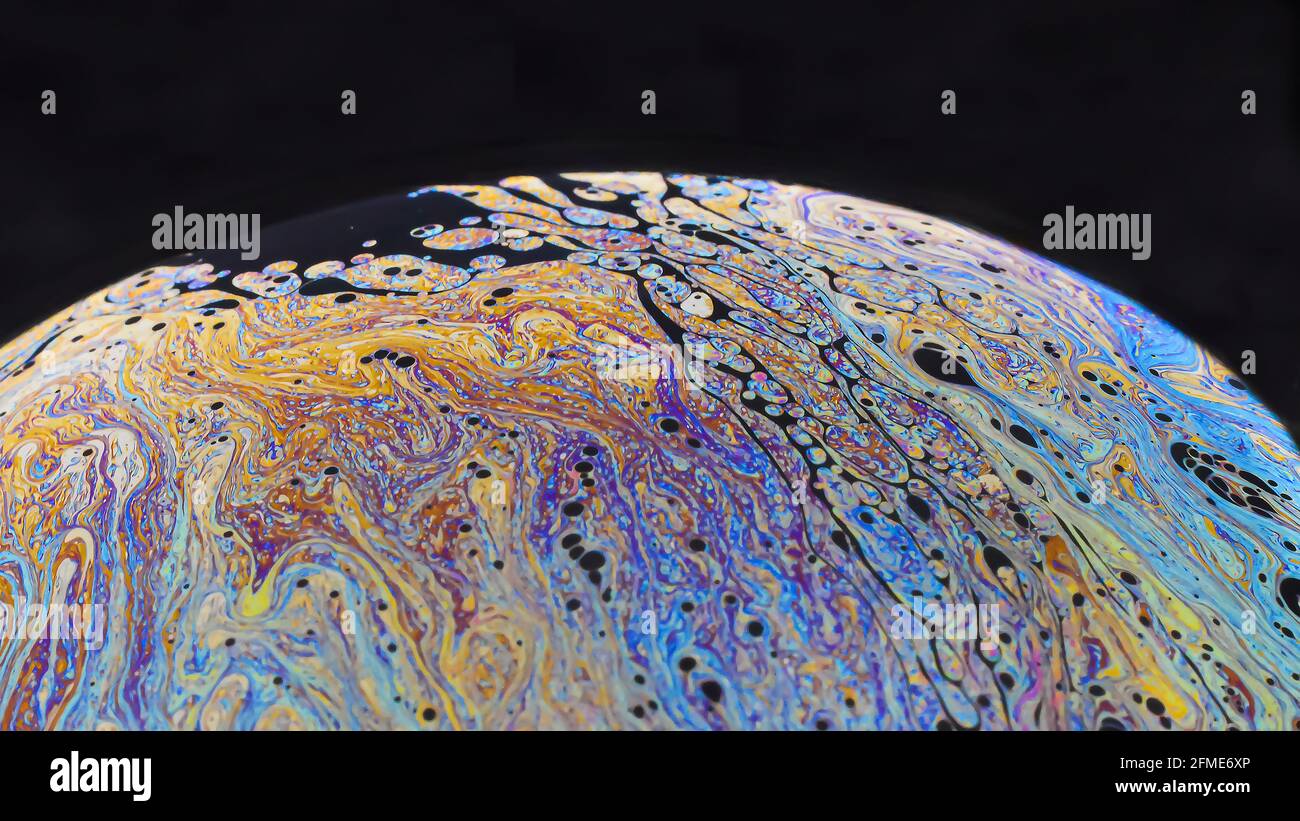 Beautiful psychedelic abstractions on the surface soap bubbles Stock Photo