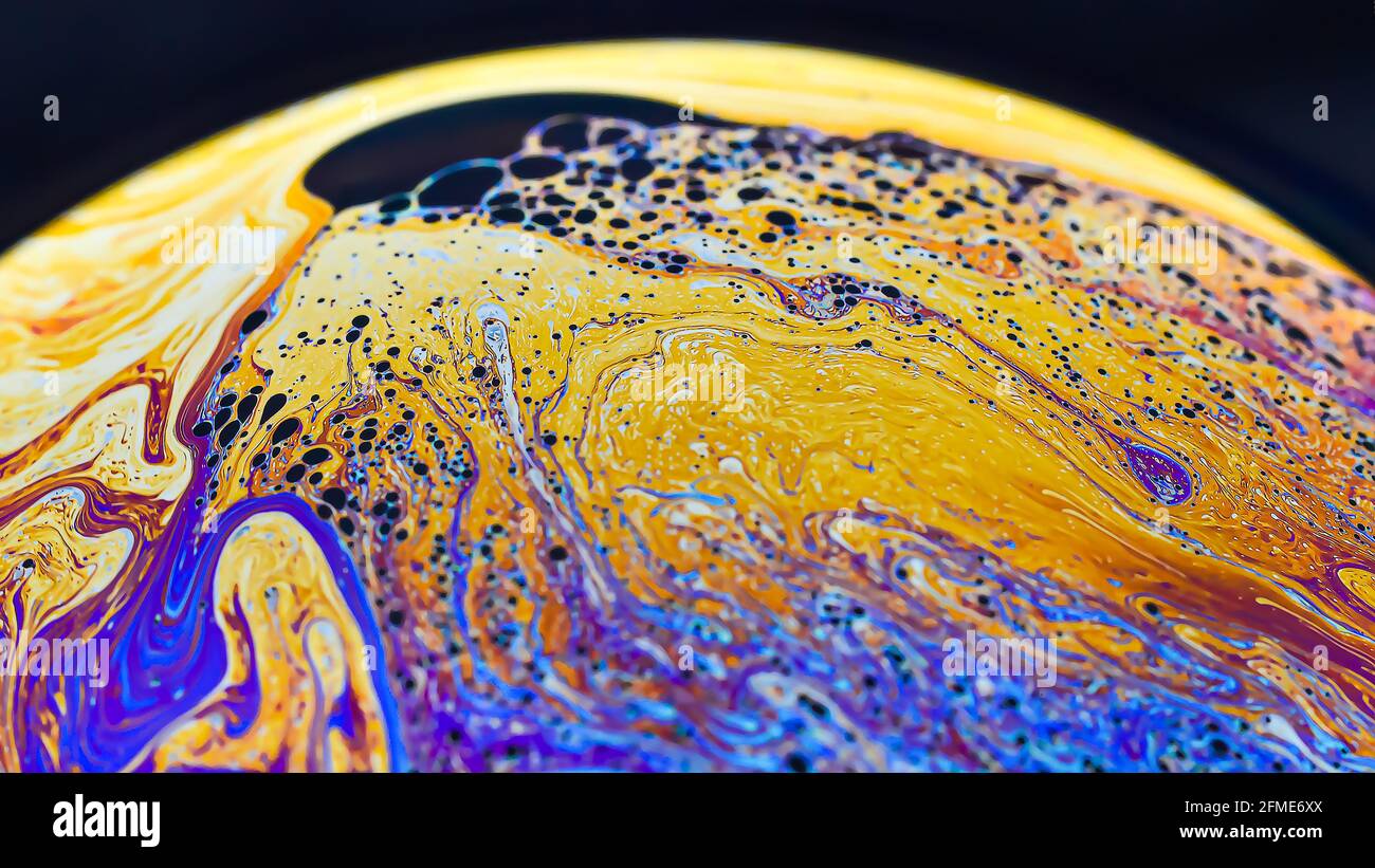 Beautiful psychedelic abstractions on the surface soap bubbles Stock Photo