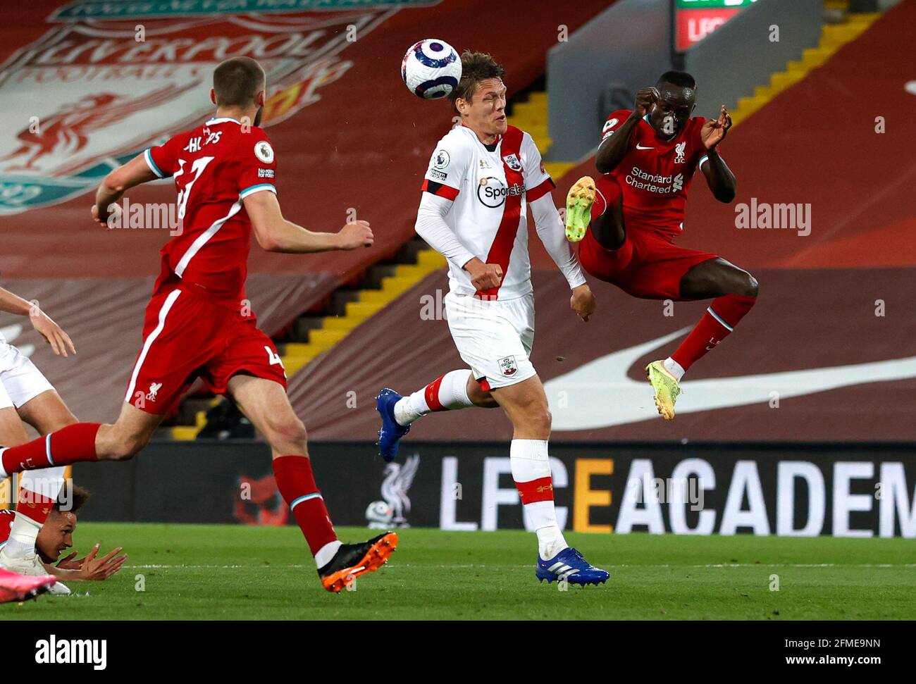 Liverpool's Sadio Mane (right) challenges Southampton's Jannik