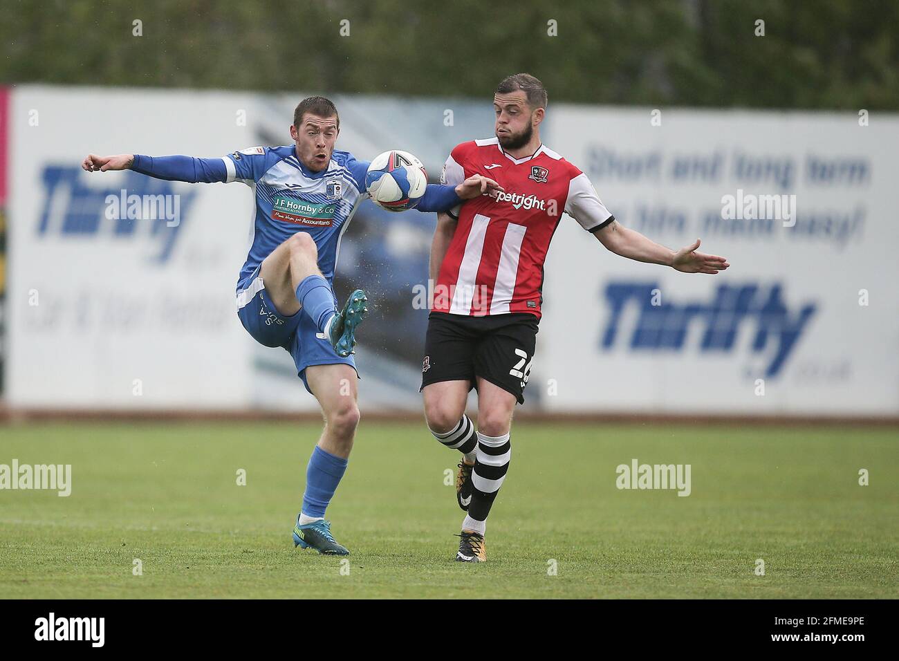 Exeter, UK. 08th May, 2021. Luke James of Barrow and Pierce Sweeney of Exeter City during the Sky Bet League 2 match between Exeter City and Barrow at St James' Park, Exeter, England on 8 May 2021. Photo by Dave Peters. Credit: PRiME Media Images/Alamy Live News Stock Photo