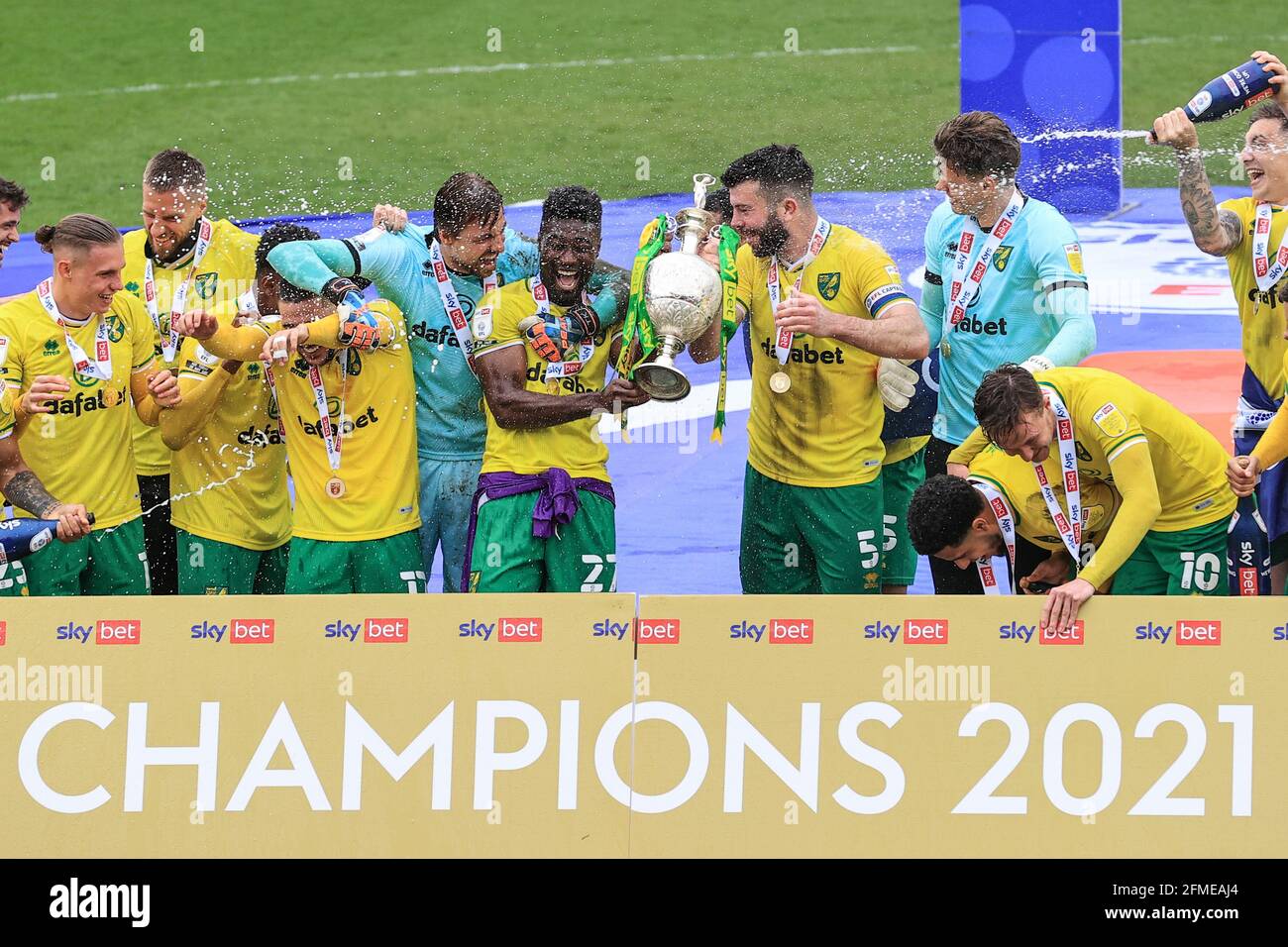 Alexander Tettey #27 of Norwich City and Grant Hanley #5 of Norwich City lift the trophy after being crowned the Sky Bet Championship league winners Stock Photo